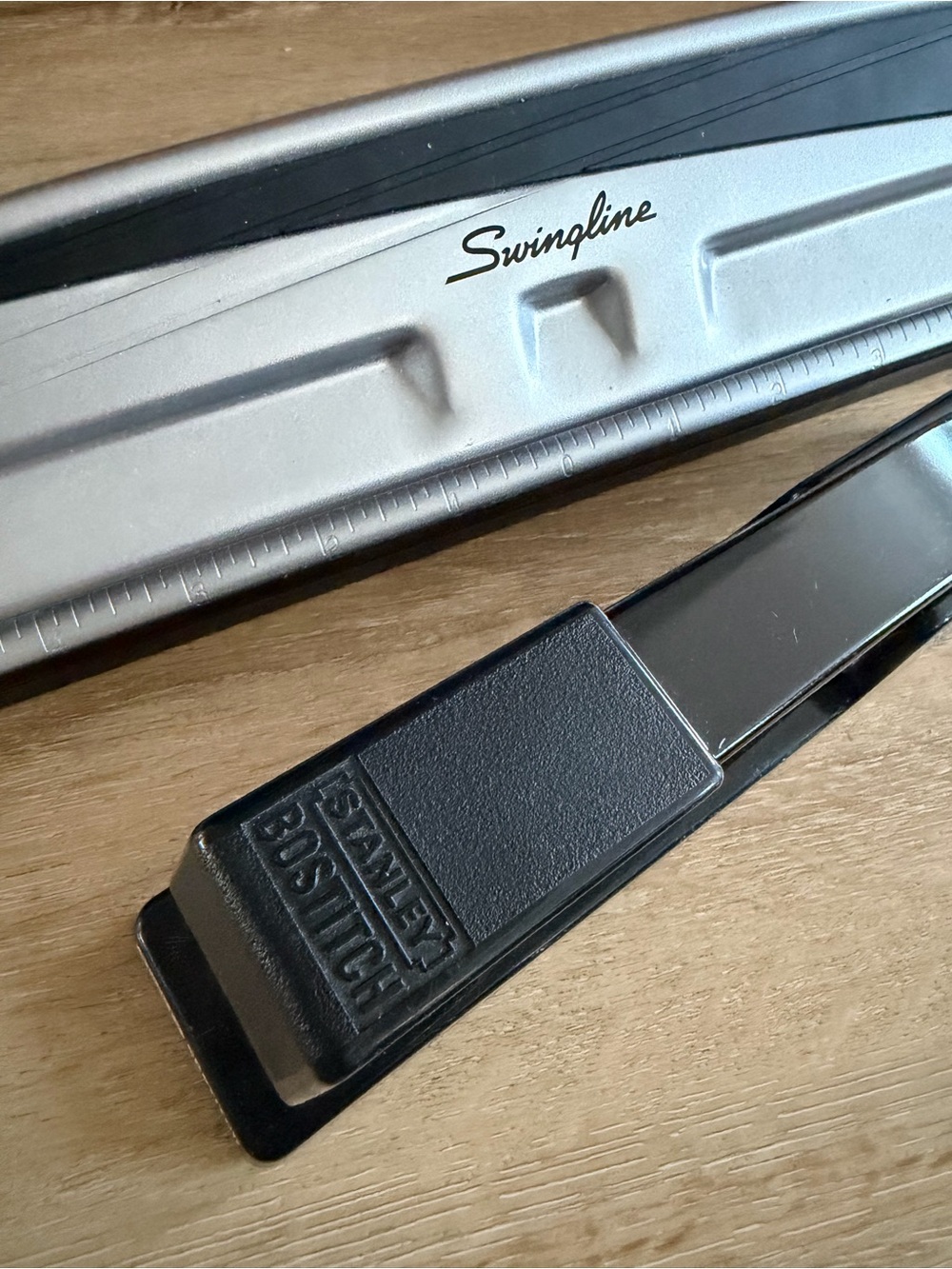 Swingline hole puncher and Bostitch stapler